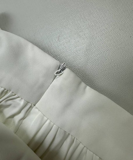 [IMPERFECT] Pixie Pleated Skirt - White in XS